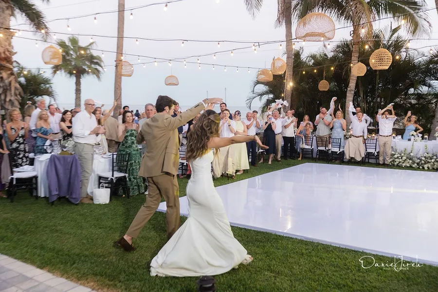 Joyful moment on the beach aisle